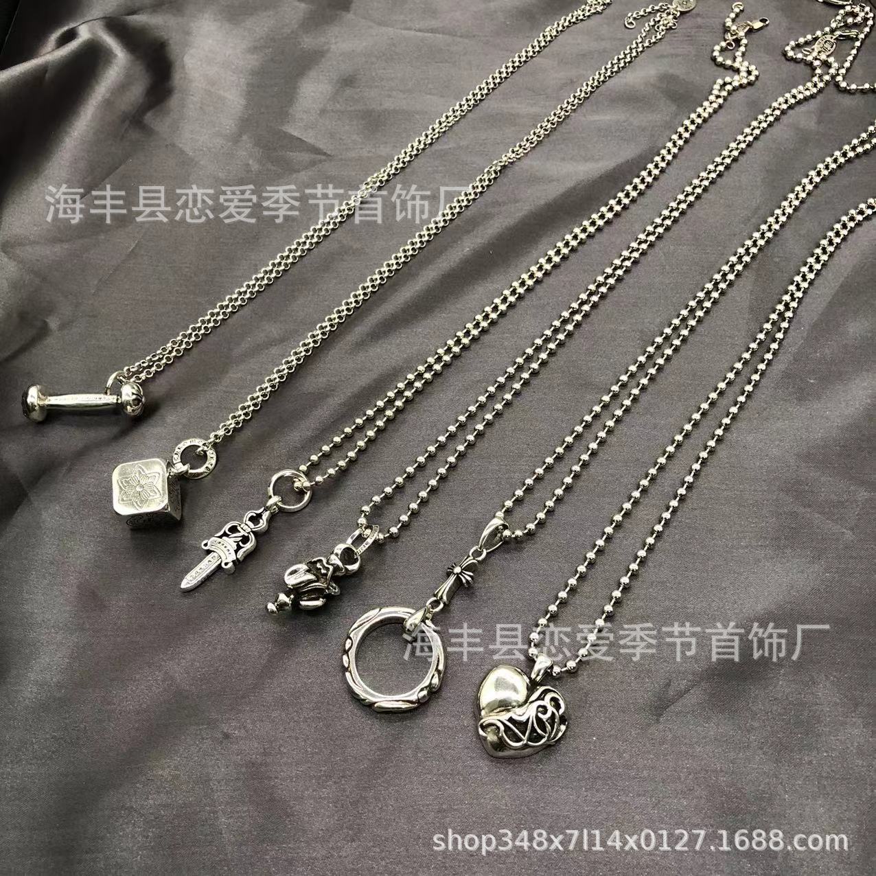 Chrome Hearts heart-shaped sword cross pendant